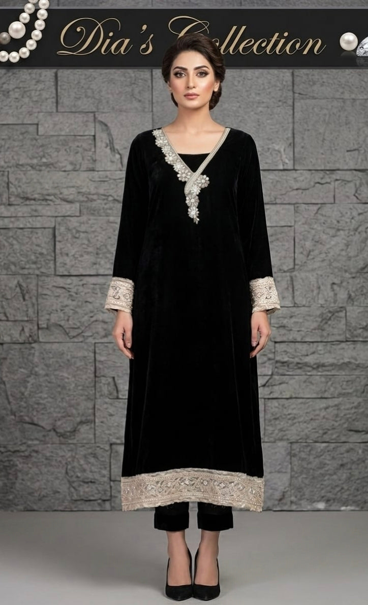 Valvet long shirt with embroidery. valvet trouser and net duppta .