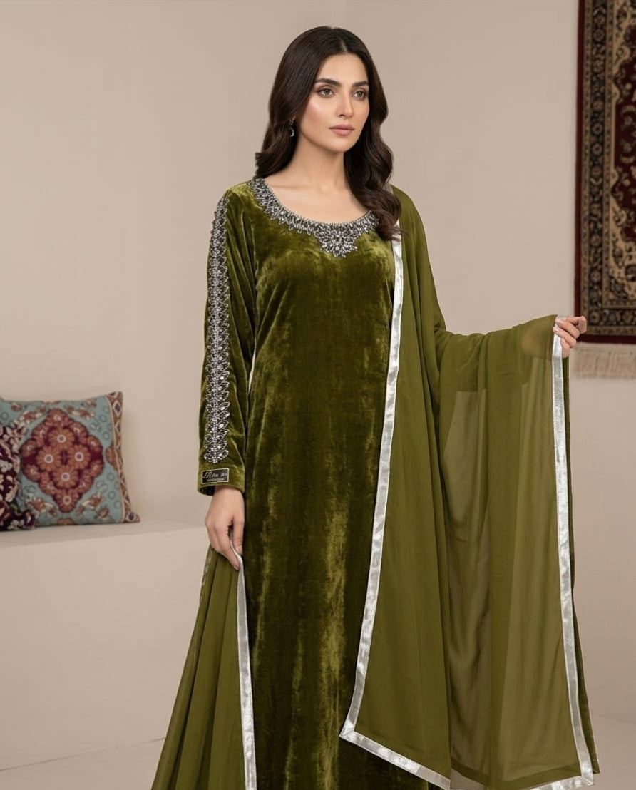 Valvet long shirt with embroidery. valvet trouser and net duppta .