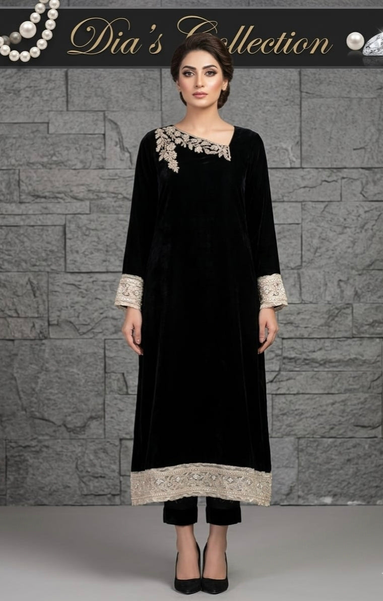 Valvet long shirt with embroidery. valvet trouser and net duppta .