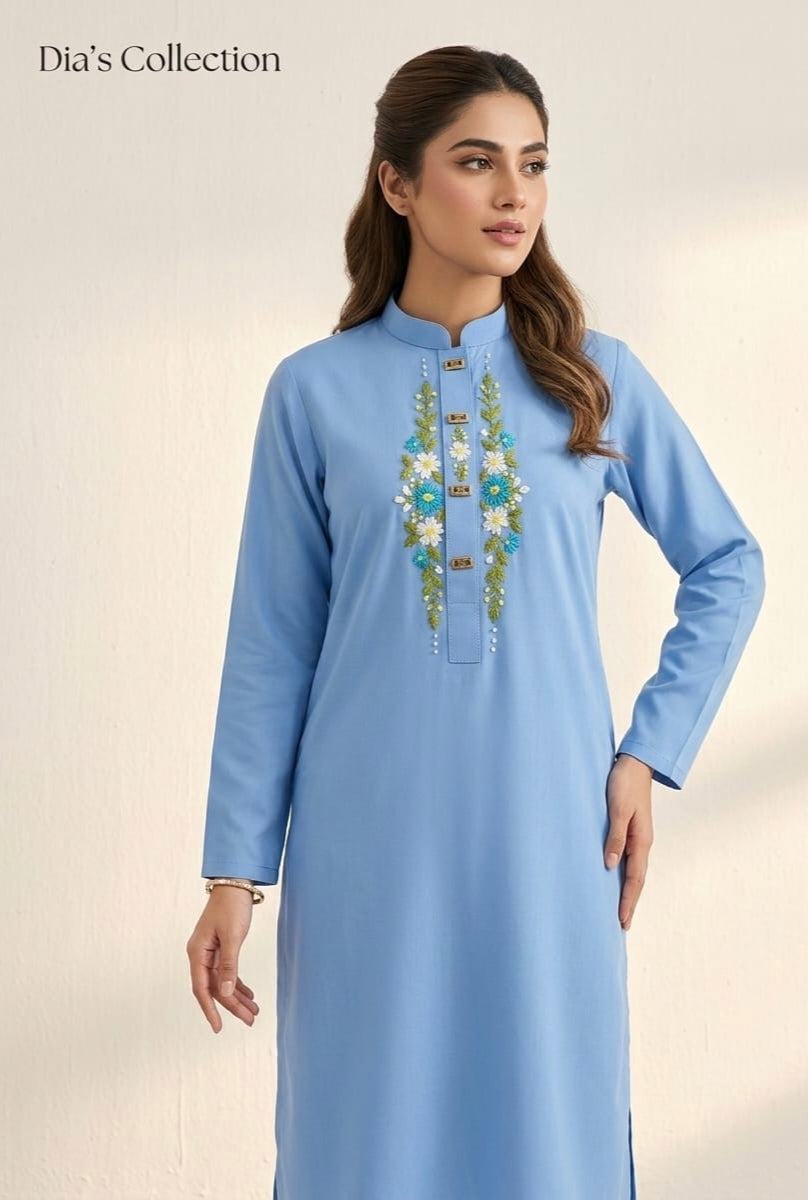 2 piece Marina dress with hand made embroidery.