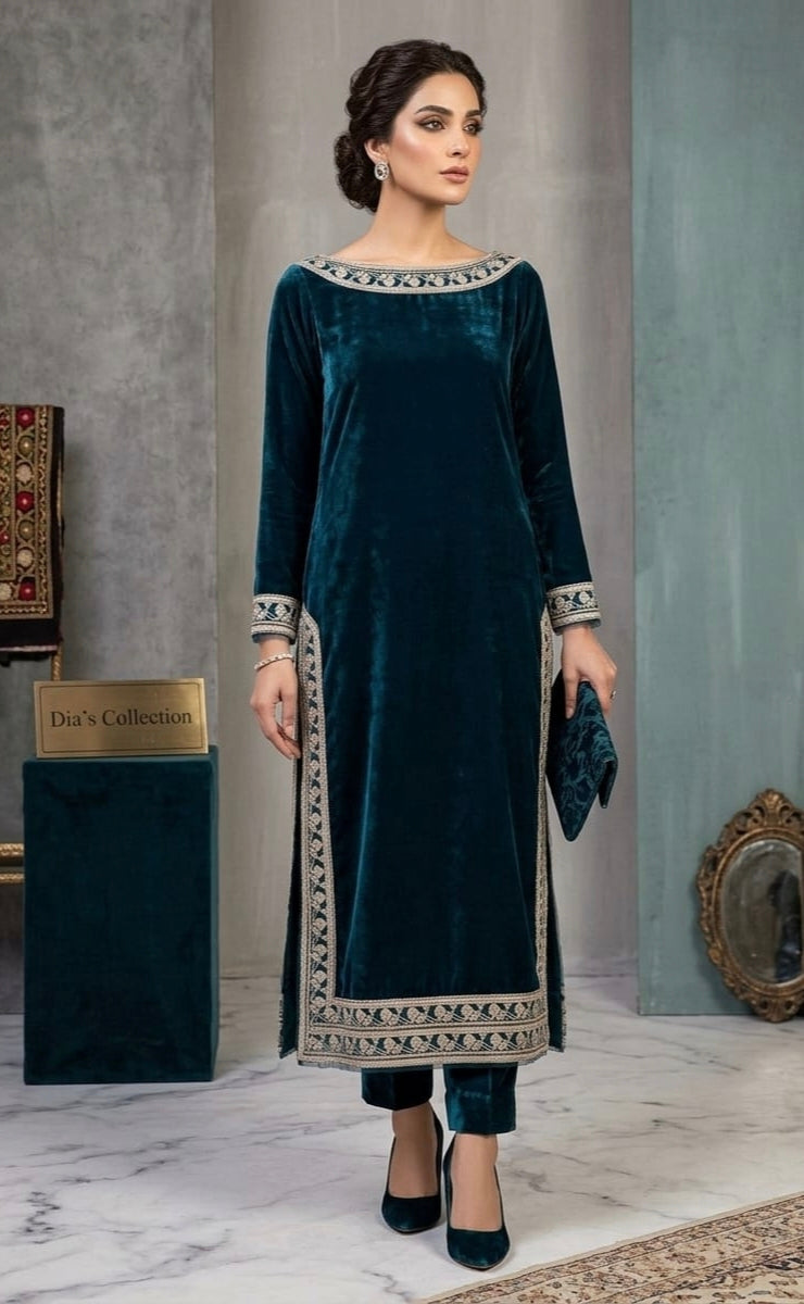 Valvet long shirt with embroidery.valvet trouser and net duppta .